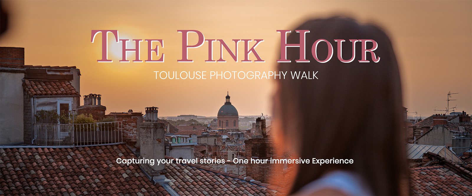 The Pink Hour, Toulouse photography walk: a woman looking at the Toulouse rooftops and the dome of La Grave at sunset